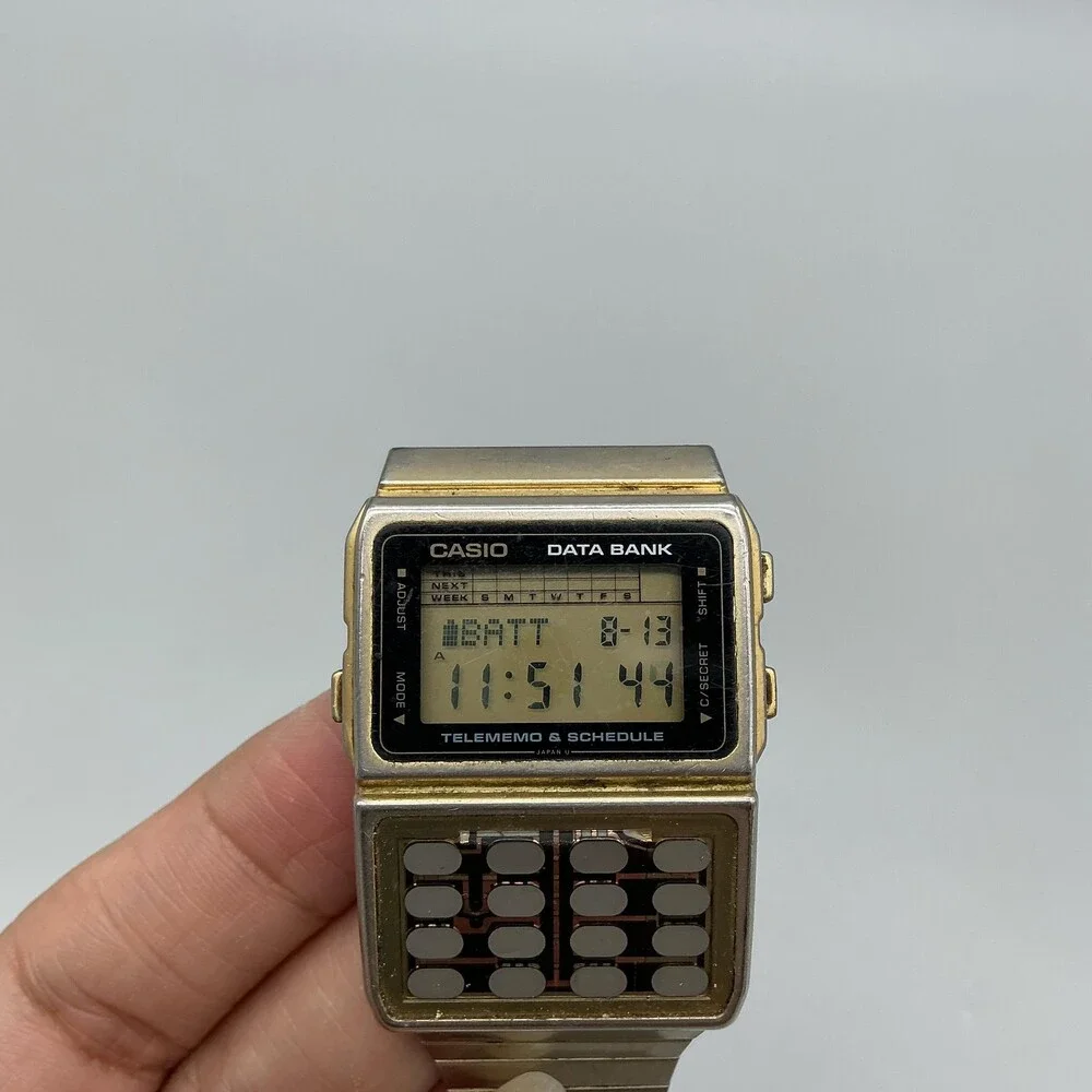 Vintage Casio DBC-610 Data Bank Mens Watch 32mm Gold Calculator Quartz Alarm